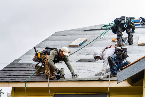 Professional Roofing technician working in French Camp, CA